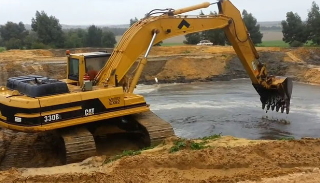 Рытье водоемов в Усть-Джегуте - цена от 920 руб. | 2Землекопа-Стд